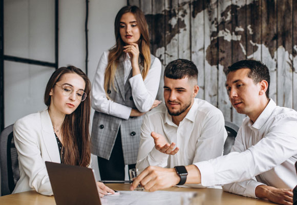 group-people-working-out-business-plan-office